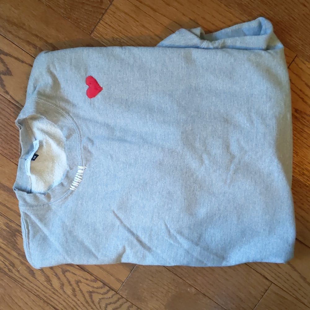 Embroidered distressed sweater